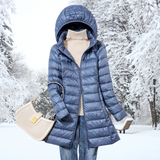 Klassische - wattierte winterjacke mit kapuze für damen – Blau