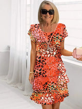 Brigitte | Elegante fließende Robe mit Volants – Orange / Rot