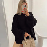 Locker sitzender pullover für lässige casual-looks für damen – Schwarz