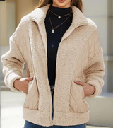 Sherpa-jacke für damen mit reibverschluss und gesteppten details – Beige