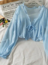 Luciana - Transluzente Bluse mit Schleife – Blau