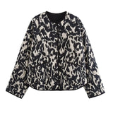 Connie Steppjacke Rundhals Animalprint – Schwarz