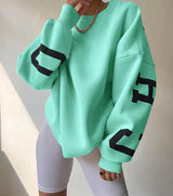 Übergroßer, trendiger pullover mit buchstaben am armel für damen – Türkis