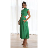 Aztrid – Elegantes Midikleid mit Cut-outs und Taschen – Grün