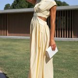 Aztrid – Elegantes Midikleid mit Cut-outs und Taschen – Creme