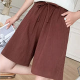 Greta | Weite Leinenhose – Braun