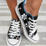 Daisy - Blumenbedruckte Denim-Sneakers – Schwarz