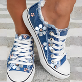 Daisy - Blumenbedruckte Denim-Sneakers – Hellblau