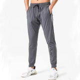 Reizo | Elastische Laufhosen für Herren Performance – Grau