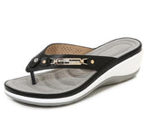 Darlene - Flip‑Flops mit niedrigem Absatz – Schwarz
