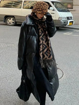 Aimee – lange leder-pufferjacke mit gürtel – Schwarz