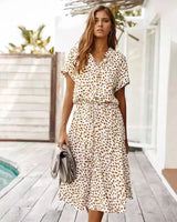 Elegantes Kleid mit Leopardenmuster – Beige