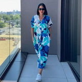 Oceania™ Viskose-Kleid mit weitem Schnitt und tropischem Print / Das Kleidungsstück, das Komfort und mühelose Schönheit vereint! – Blau mit weißem und blauem Laub