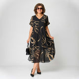 Franziska™ Kleid mit Volant und Gold-Print – Schwarz mit Goldenen Mustern