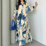 Marrakesch™ Maxi-Kleid mit künstlerischen Prints und Puffärmeln – Blau