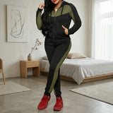 Prisma™-Set mit Sportjacke und formendem Look – Schwarz mit Grünen details
