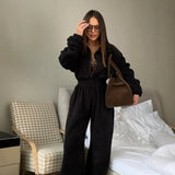 Vancouver™ Sweat-Jumpsuit mit Stehkragen und definierter Taille – Schwarz
