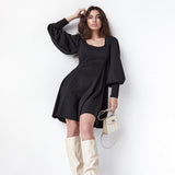 Sofia - Elegantes Kleid mit Puffärmeln – Schwarz