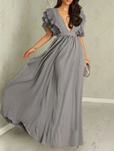 Elysia – Maxikleid mit tiefem V-Ausschnitt und Rüschenärmeln – Grau