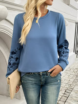 Mia | Sweatshirt mit Blumendruck – Meeresblau