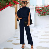 Shelly – Eleganter Jumpsuit mit hohem Halsausschnitt und weitem Bein – Marineblau