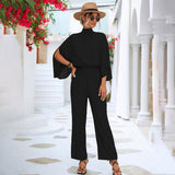 Shelly – Eleganter Jumpsuit mit hohem Halsausschnitt und weitem Bein – Schwarz