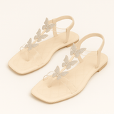 Lina - Glitzer-Sandalen mit Schmetterlingen und Zehenriemen – Beige