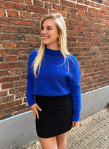Eleganter schwarzer Midirock aus veganem Leder – zeitlos & vielseitig – Blau