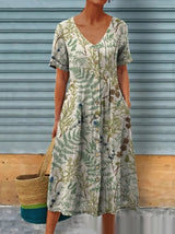 Luna - Midikleid mit Blumenmuster und Knopfverschluss vorne – Hellgrün