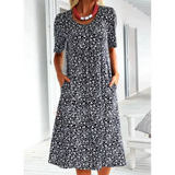 Jehaia - Lässiges Kleid mit Rundhalsausschnitt und Blumenmuster – Schwarz