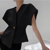 Alva - Figurbetontes Top mit asymmetrischem Design – Schwarz