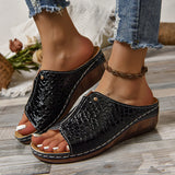 Ivy - Metallic-Keilsandaletten mit raffiniertem Design – Schwarz