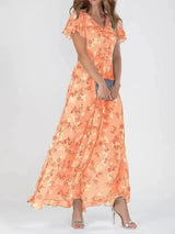 Junmie – Elegantes Chiffon-Maxikleid mit Blumenmuster – Orange