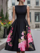 Xavia - Elegantes Midikleid mit floralem Muster – Schwarz