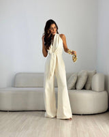 Kamwi - Eleganter Jumpsuit Mit Drapiertem Ausschnitt Und Weitem Bein – Cremefarben