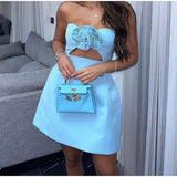 Rana - Trägerloses Minikleid mit Ausschnitt in Pastellrosa – Blau