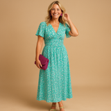 Damen Kleid mit kurzen Ärmeln, V-Ausschnitt und Blumenmuster mit Smokdetail – Grün