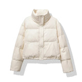 Damen Kurze Steppjacke mit Stehkragen Druckknopfleiste und Eingrifftaschen – Beige
