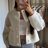 Damen Kurze Strickjacke mit Rundhalsausschnitt Knopfverschluss Zwei Taschen und Gerippten Bündchen – Weiß