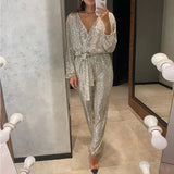 Damen Langärmliger Pailletten-Jumpsuit mit tiefem V-Ausschnitt und Bindegürtel – Gold