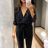 Damen Langärmliger Pailletten-Jumpsuit mit tiefem V-Ausschnitt und Bindegürtel – Schwarz