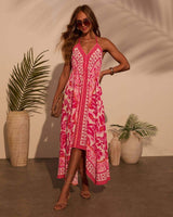Damen Maxikleid mit V-Ausschnitt und Spaghettiträgern mit offenem Rücken und Zipfelsaum – Rosa