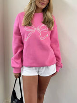 Damen Pullover mit Rundhalsausschnitt langen Ärmeln mit Bündchen und Schleifenstickerei – Rosa