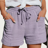 Damen Shorts mit elastischem Bund und Kordelzug sowie aufgesetzten Taschen und umgeschlagenen Säumen – Lila