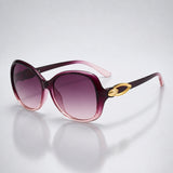 Damen-Sonnenbrille mit Schmetterlingsform und Metallic-Akzenten – Magenta