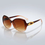 Damen-Sonnenbrille mit Schmetterlingsform und Metallic-Akzenten – Bernstein