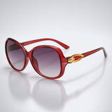 Damen-Sonnenbrille mit Schmetterlingsform und Metallic-Akzenten – Rot