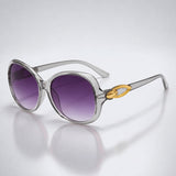 Damen-Sonnenbrille mit Schmetterlingsform und Metallic-Akzenten – Grau