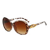 Damen-Sonnenbrille mit Schmetterlingsform und Metallic-Akzenten – Leopard