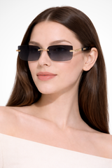 Damen Sonnenbrille ohne Rahmen mit rechteckigen Gläsern und Metallsteg – Grau